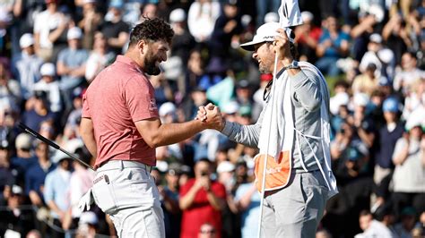 Jon Rahm holds off Max Homa to win Genesis Invitational, rises to World.